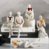 Bücherliebhaber-Figur 